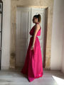 Fushsia crossed neck Stelios koudounaris long dress