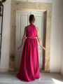 Fushsia crossed neck Stelios koudounaris long dress