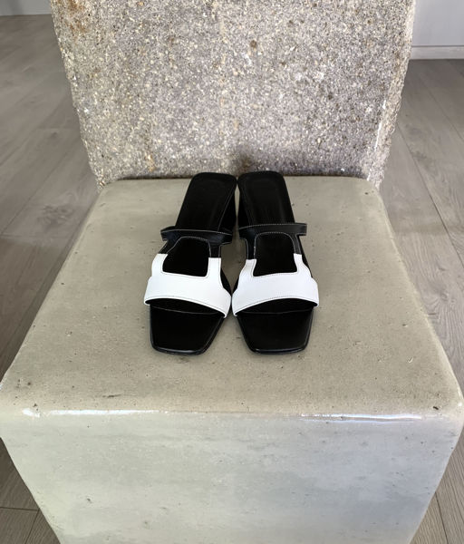 Hephaestus mules leather black and white Zeus Dione