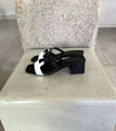 Hephaestus mules leather black and white Zeus Dione